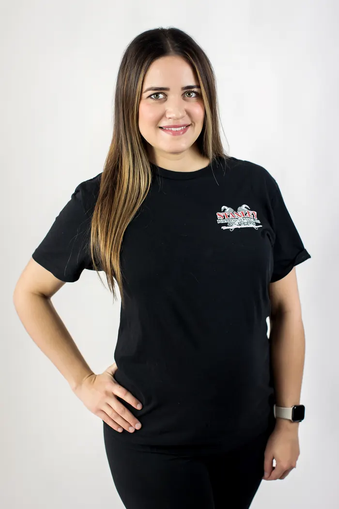 Portrait of a Stanley Plumbing Services team member (18 of 18) in uniform