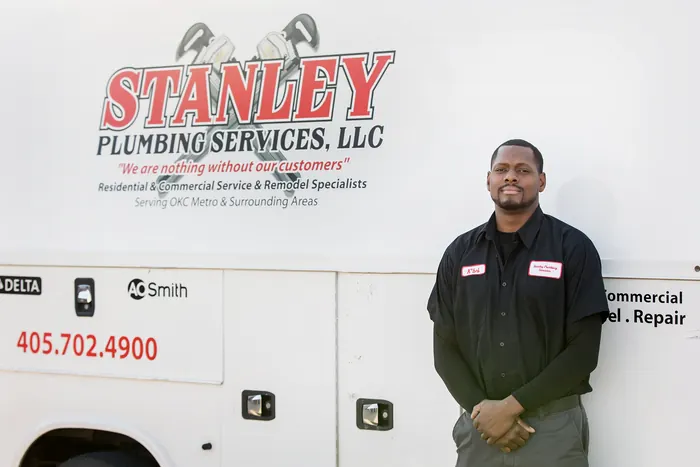 Portrait of a Stanley Plumbing Services team member (17 of 18) in uniform