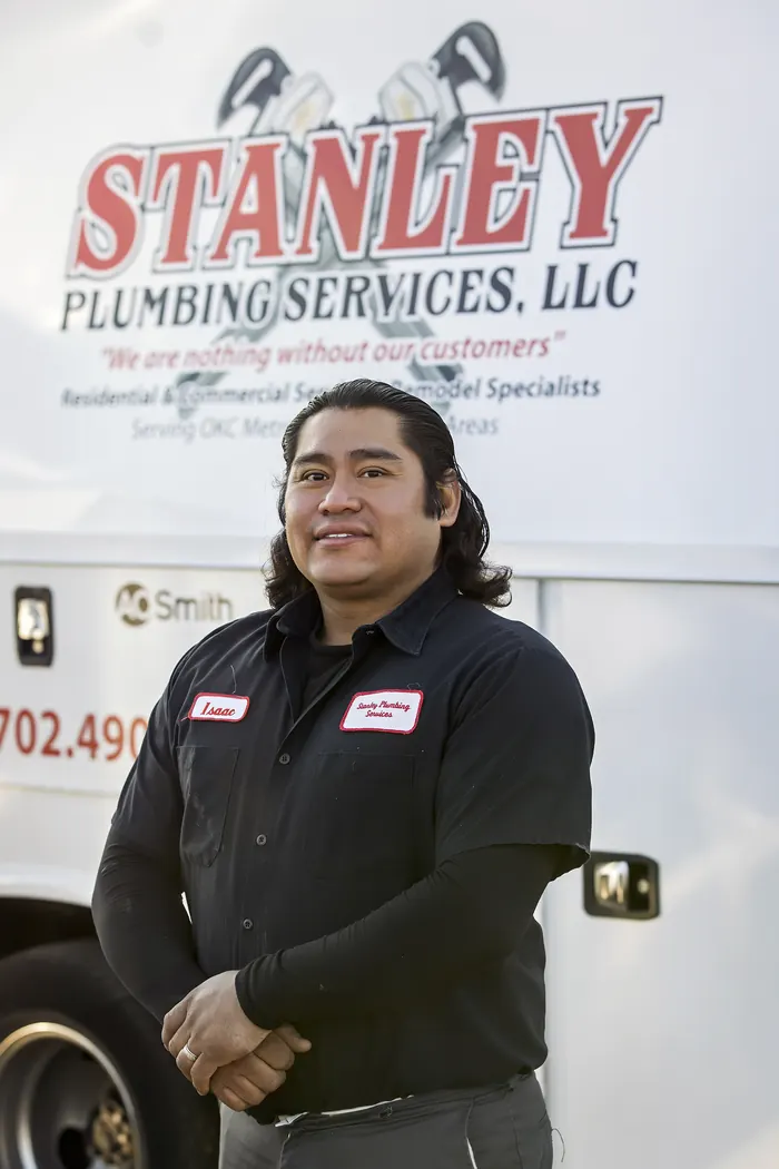 Portrait of a Stanley Plumbing Services team member (2 of 18) in uniform