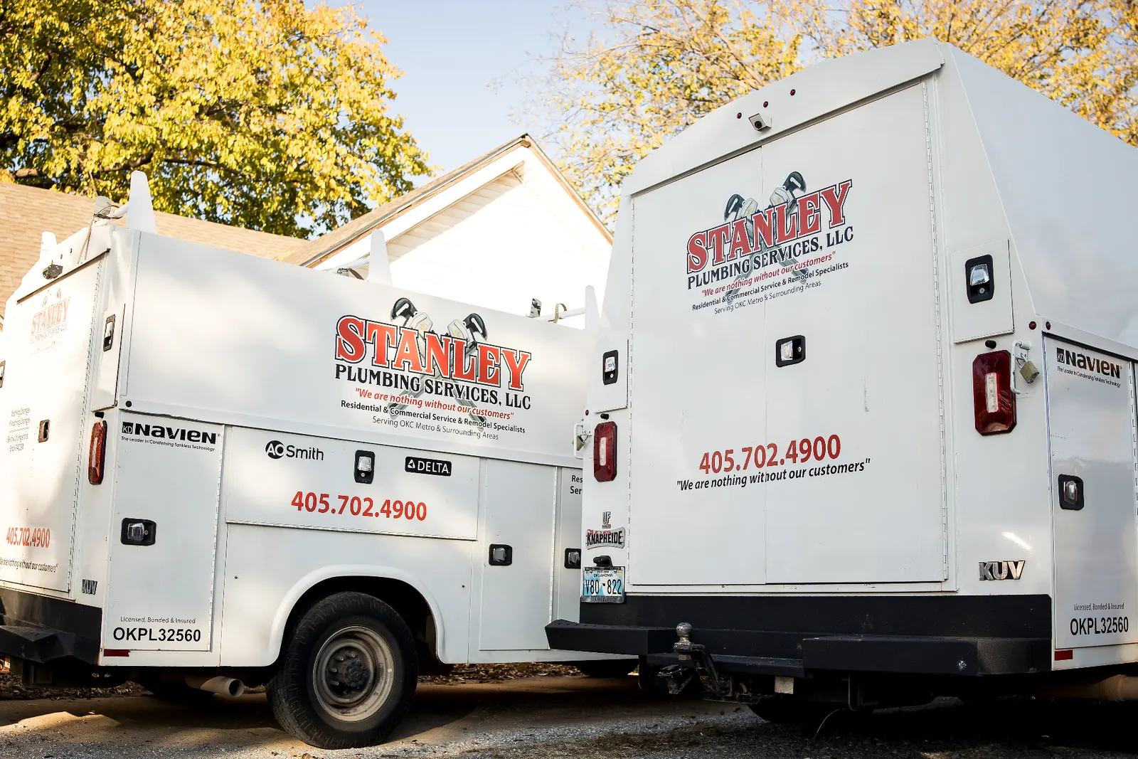 Stanley Plumbing service trucks lined up and ready for the day