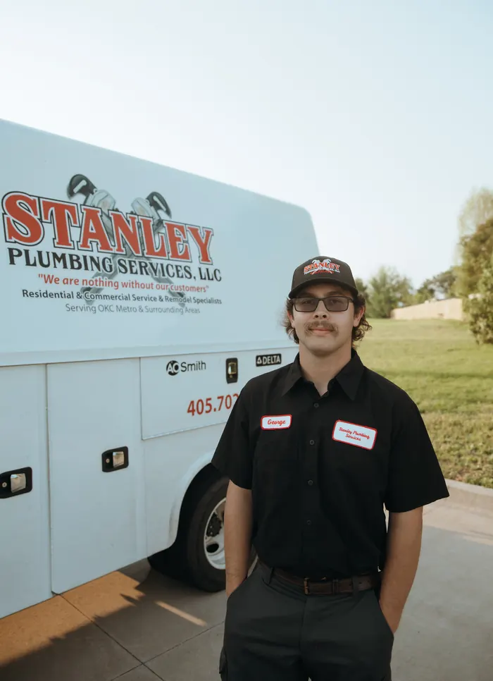 Portrait of a Stanley Plumbing Services team member (16 of 18) in uniform