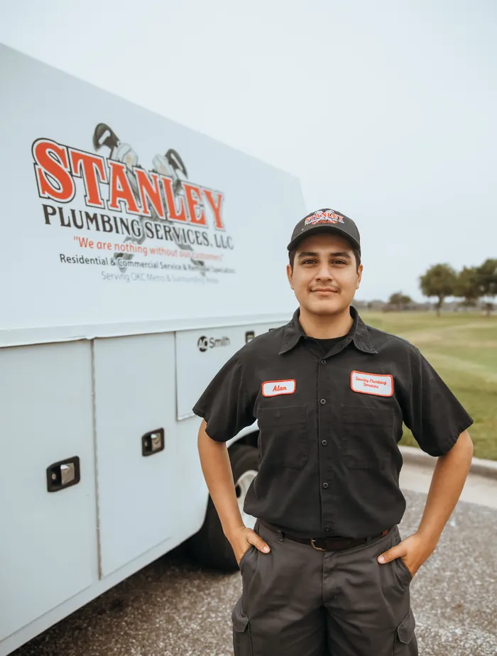 Portrait of a Stanley Plumbing Services team member (9 of 18) in uniform