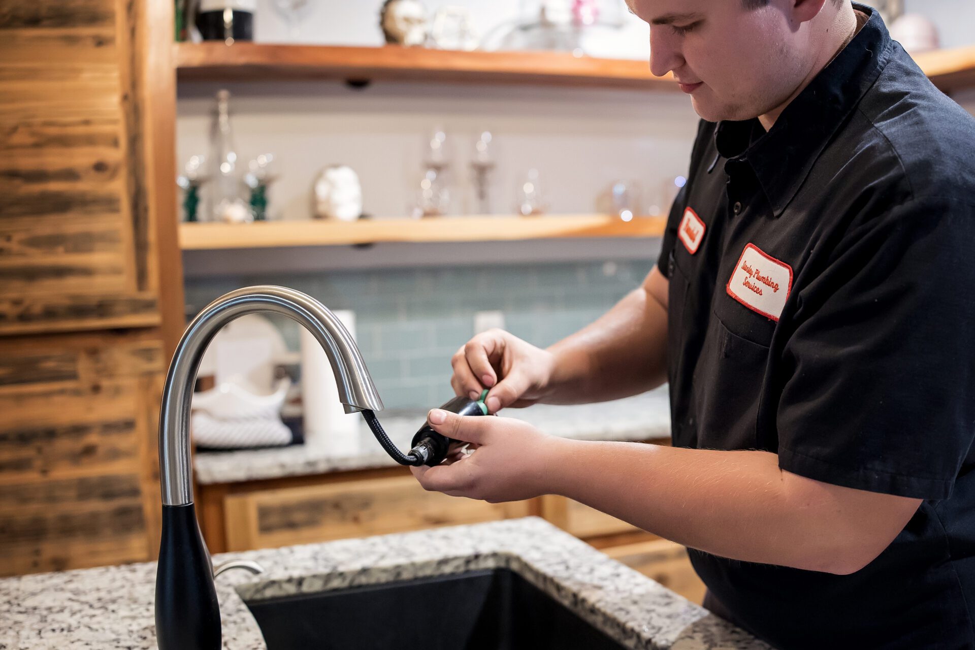 A pumbler giving hand shake to a client